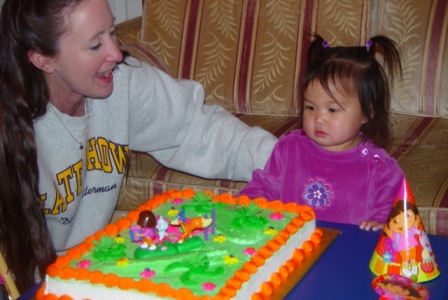 Kasen blowing out her candles